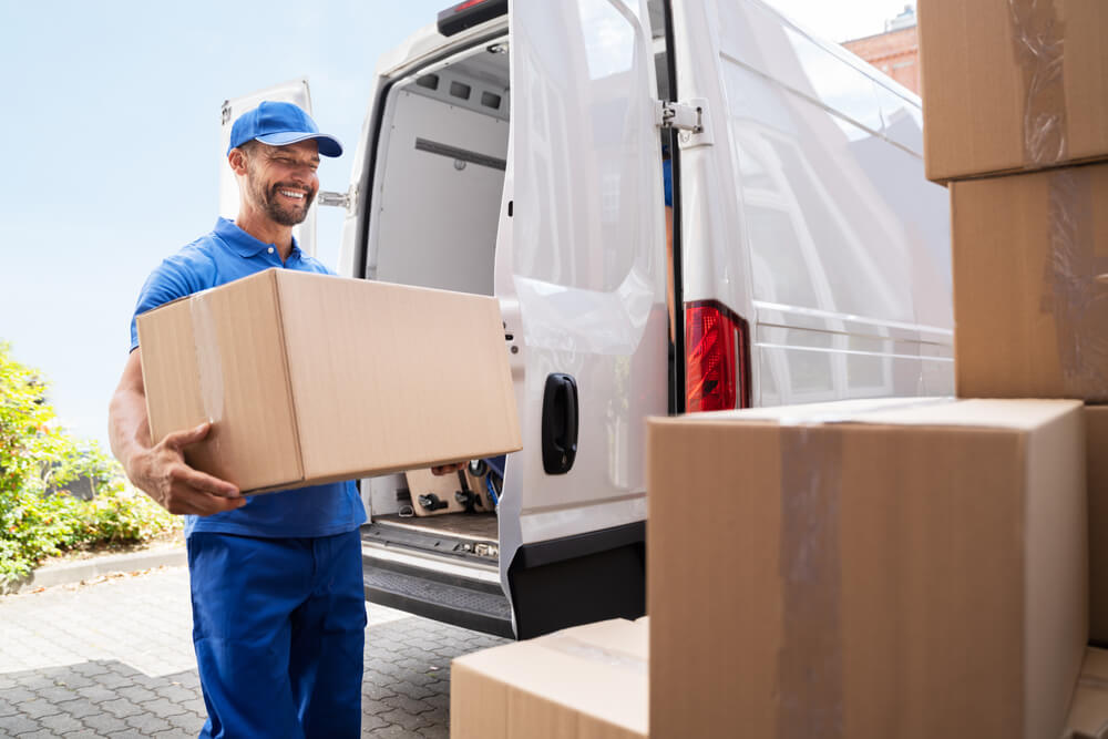Kyle Movers Team Packing Boxes